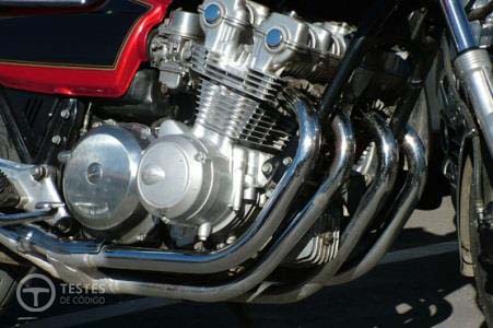 Pergunta IMT: Os motores a quatro tempos que equipam determinados motociclos, têm que possuir, pelo menos: