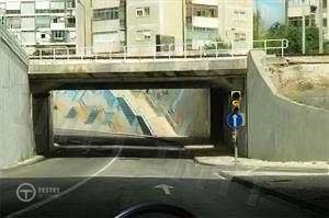 Pergunta IMT: No sistema principal de luzes, perante a luz amarela, o condutor deve: